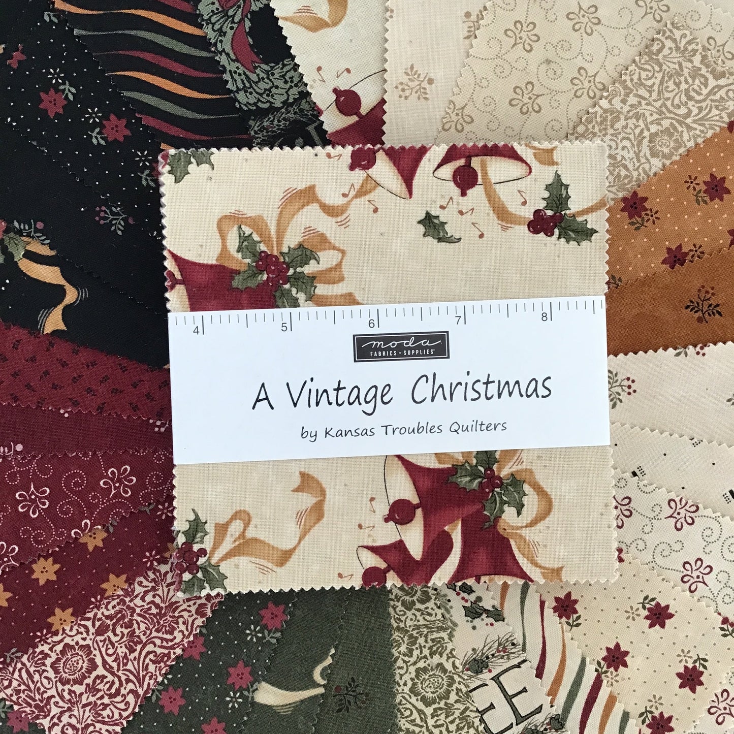 A Vintage Christmas Charm Pack by Kansas Troubles Quilters for Moda Fabrics